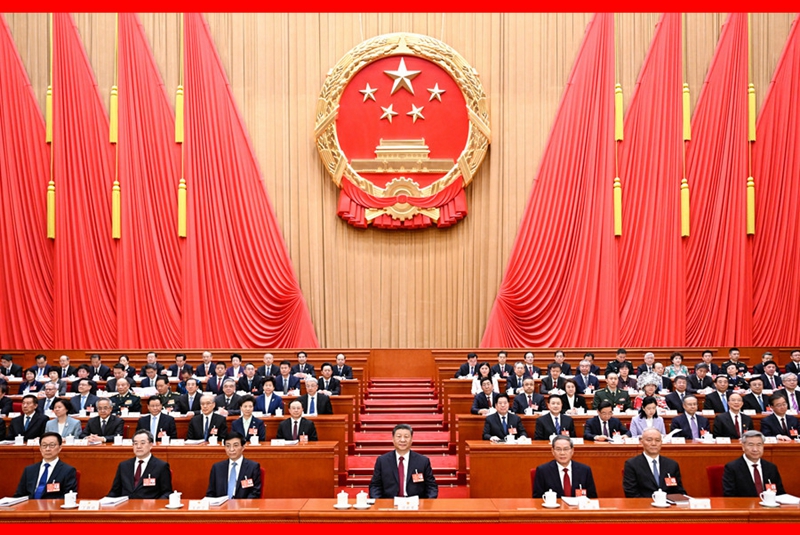 十四届全国人大三次会议在京开幕 习近平等在主席台就座